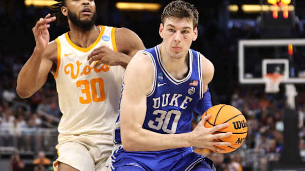 Duke Blue Devils center Kyle Filipowski drives against Tennessee